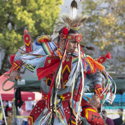 An adult contest dancer competes during the Berkeley Indigenous Peoples Day Pow Wow on Oct. 12 2019 at Martin Luther King Civic Center Park in Berkeley, California.